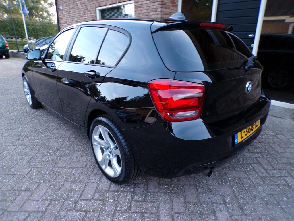 BMW 1-serie 114i EDE Business, Auto's, 1-Serie, Euro 5, Gebruikt, Zwart