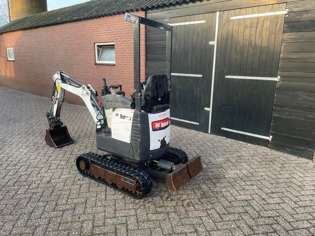 Bobcat E10 Bj 2012 - Spelingsarm + extra sloop functie, Tuin en Terras, Ophalen of Verzenden