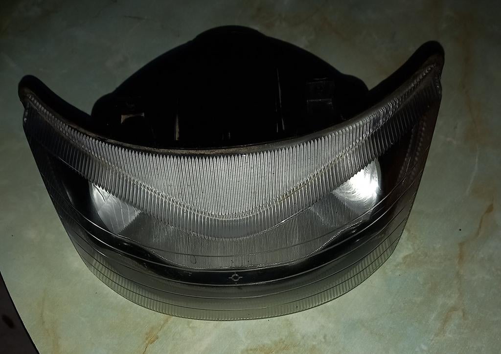 Koplamp Aprilia SR (Piaggio) in Nieuwstaat origineel, Ophalen of Verzenden, Nieuw, Koplamp, [Overige automerken]