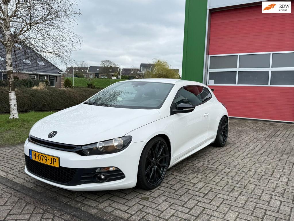 Volkswagen Scirocco 2.0 TSI Highline Airco DSG Cruise Carpla, Auto's, Volkswagen, Zwart, 4 cilinders, 1984 cc, 4 stoelen