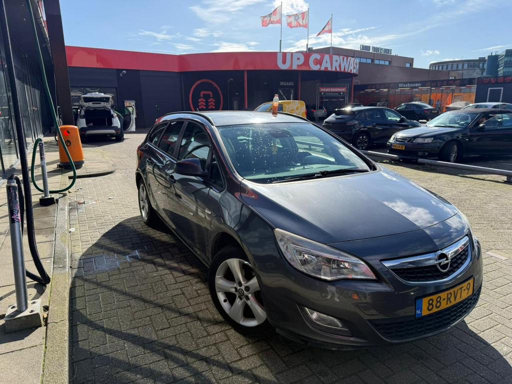 Opel Astra 1.4 74KW ST 2011 Grijs, Auto's, Voorwielaandrijving, 4 cilinders, 100 pk, Origineel Nederlands