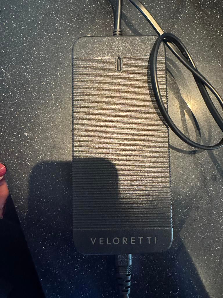 Veloretti oplader (1pin), Ophalen of Verzenden, Zo goed als nieuw