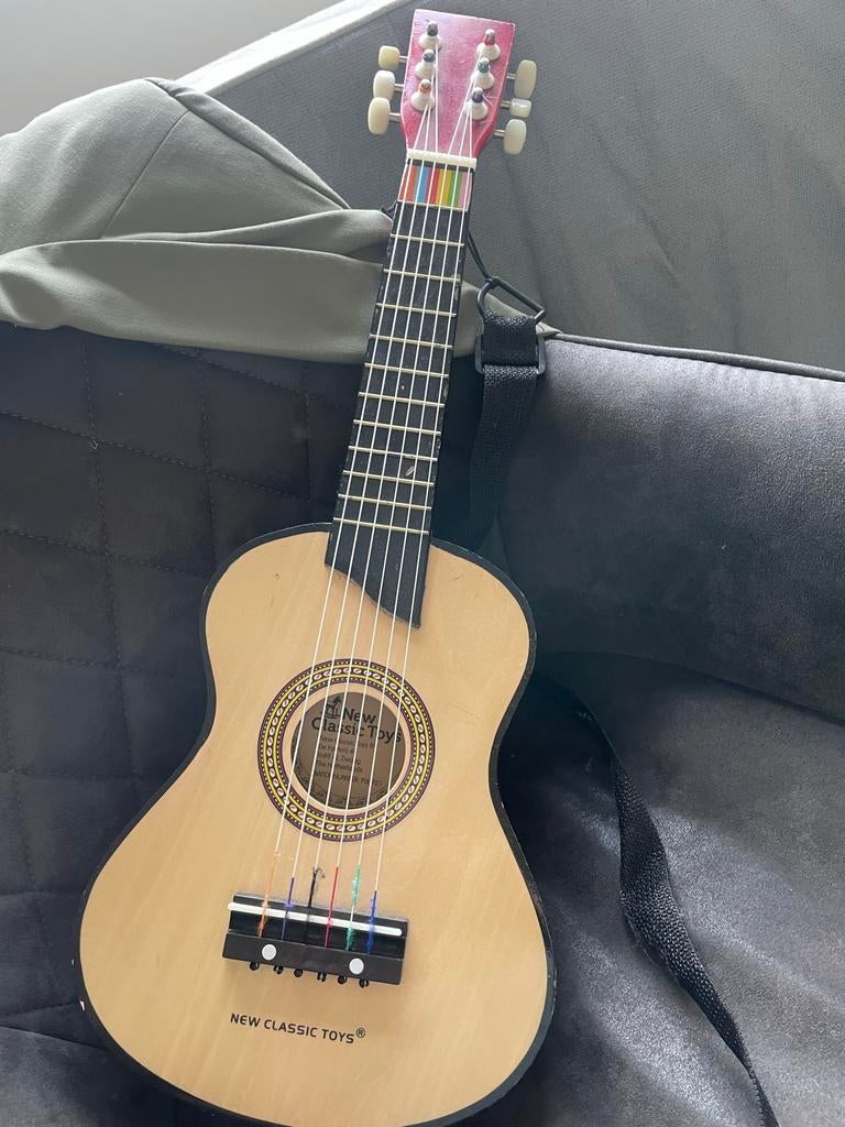 Speelgoed gitaar van New Classic Toys, Kinderen en Baby's, Speelgoed | Overig, Ophalen, Gebruikt, Jongen of Meisje