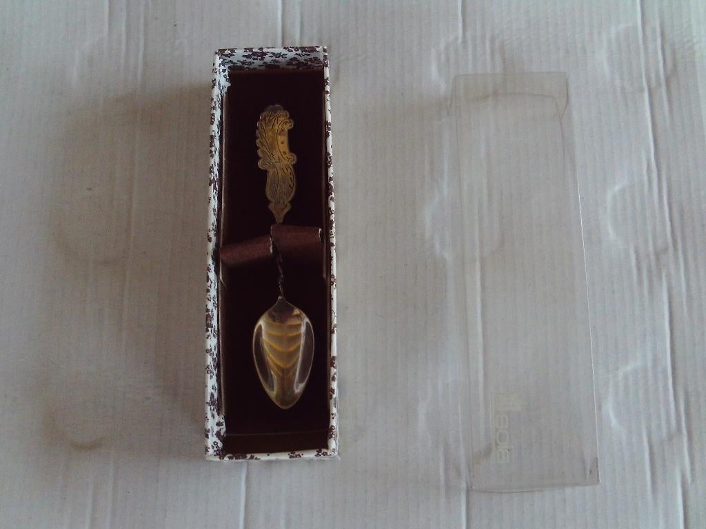 sola lepeltje in org. doosje, Ophalen of Verzenden, Zo goed als nieuw, Rvs of Chroom