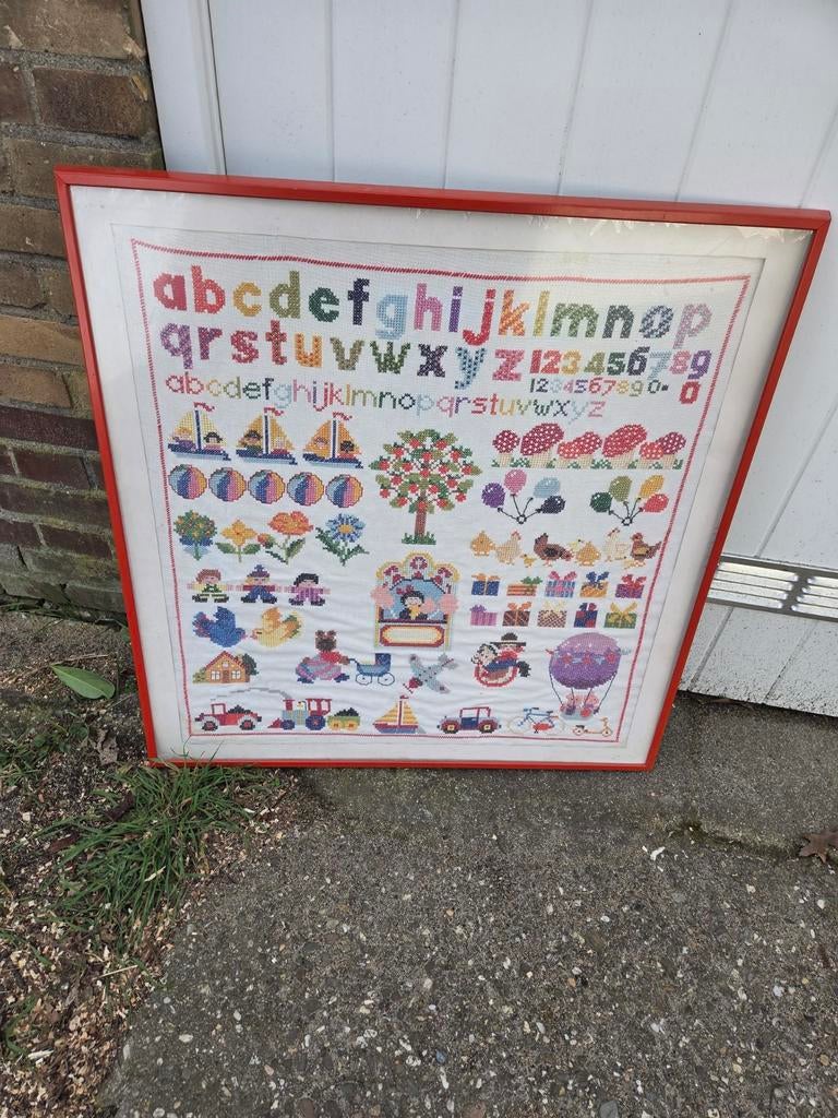 Retro handgemaakt geborduurd alfabet, Ophalen