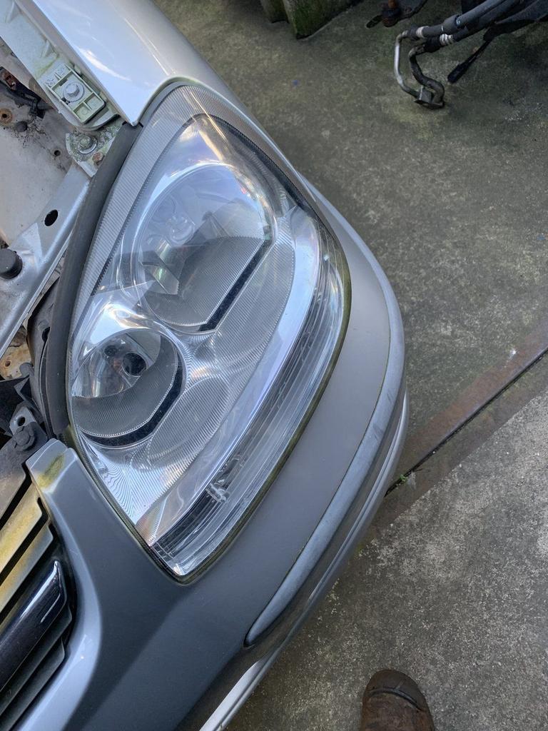 koplamp links nissan almera tino 2003 tot 2006 26010BU800, Gebruikt, -, -, Ophalen of Verzenden