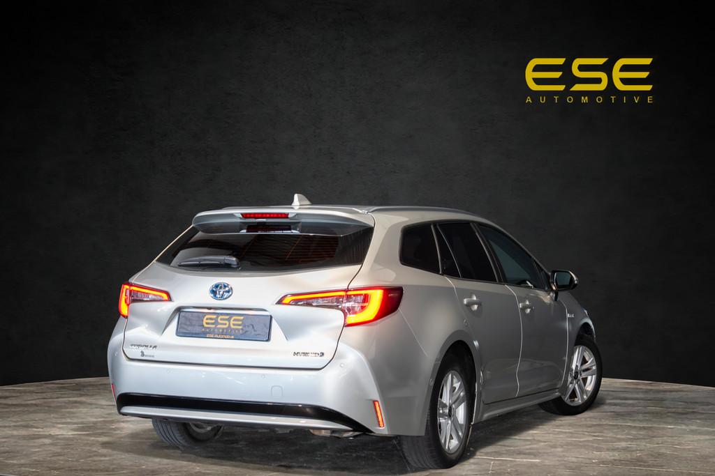 Toyota Corolla 1.8 Hybrid Business Plus | Navigatie | Camera, Stof, Gebruikt, Euro 6, Corolla