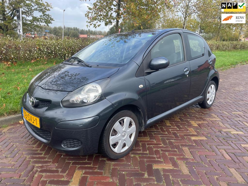 Toyota Aygo 1.0-12V Navigator-Airco-1e eigenaar, Auto's, Voorwielaandrijving, Euro 5, Gebruikt, Elektrische ramen