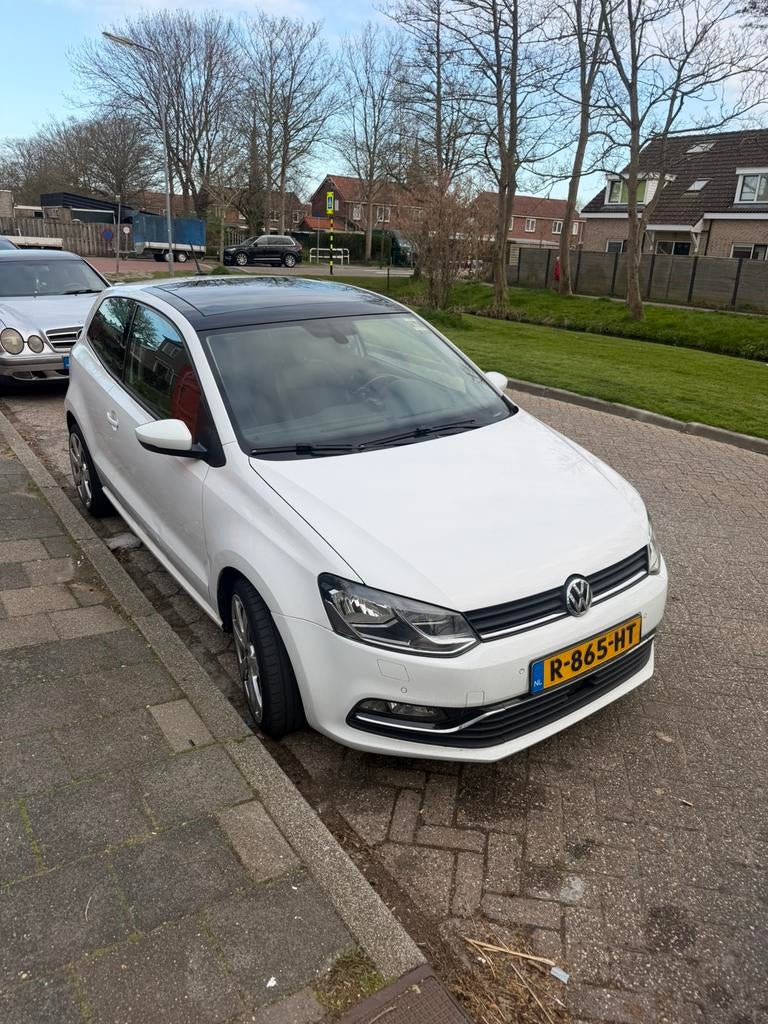 Volkswagen Polo 1.2 TSI 81KW BMT DSG 2017 Wit, Auto's, Volkswagen, 40 €/maand, Zwart, Wit, Particulier