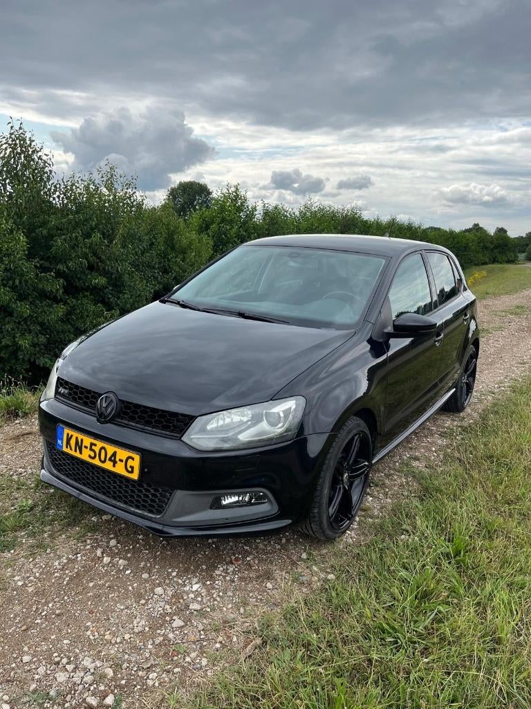 Volkswagen Polo 1.2 TSI 77KW DSG 2011 Zwart, Auto's, Stof, 40 €/maand, Zwart, 4 cilinders