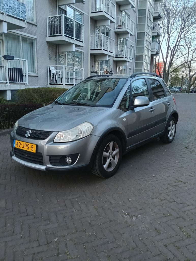 Suzuki SX4 1.5 2007 Grijs, Auto's, Voorwielaandrijving, 15 km/l, 4 cilinders, 49 €/maand
