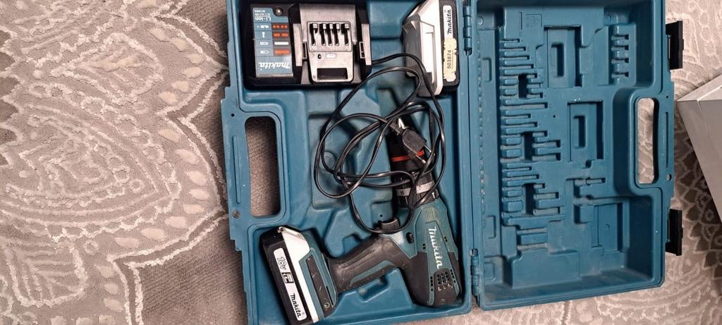 Makita accutool HP457D 18V met 2 accu's, lader en koffer, Ophalen of Verzenden
