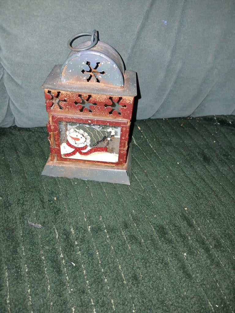 Kaarsenhouder kerst, Ophalen