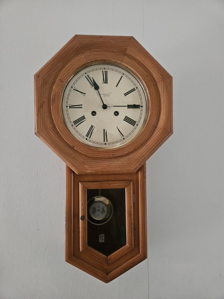 Wandklok met sleutel en slagwerk, Ophalen