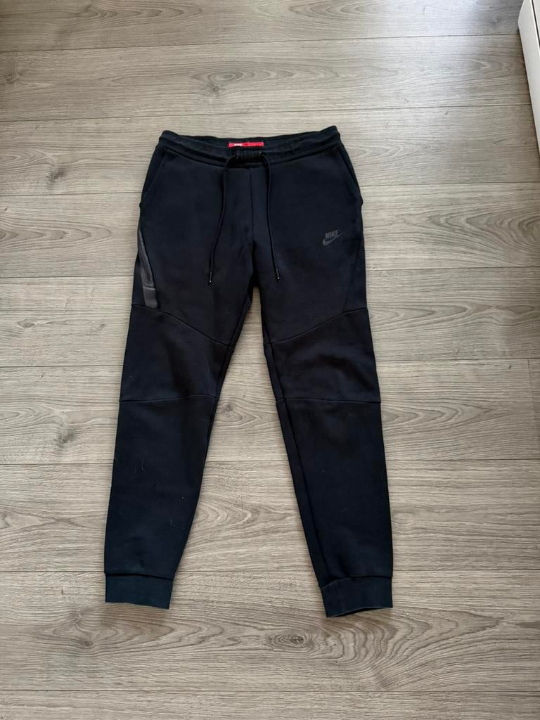 Nike tech fleece broek, Ophalen of Verzenden, Gedragen, Maat 48/50 (M), Zwart