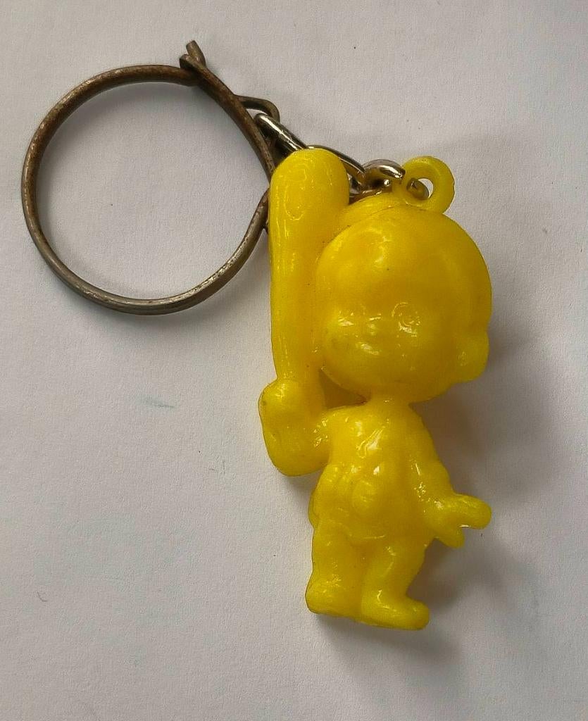 Bamm bamm Rubble ( uit Flintstones ) sleutelhanger (geel), Ophalen of Verzenden, Zo goed als nieuw