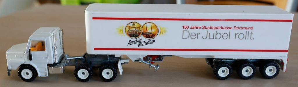 Siku 3119 Scania 143H met oplegger Stadtsparkasse Dortmund, Hobby en Vrije tijd, Ophalen, Zo goed als nieuw, Bus of Vrachtwagen