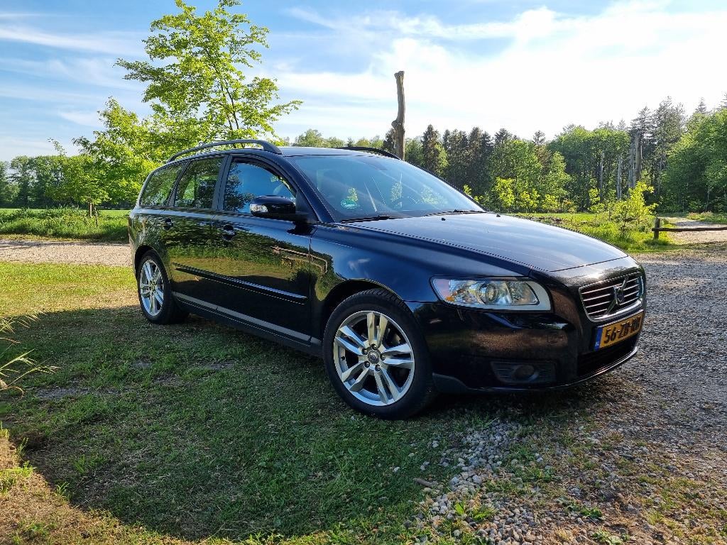 Volvo V50 2.4 125KW 2007 Zwart, Auto's, Volvo, Voorwielaandrijving, Stof, 700 kg, Zwart