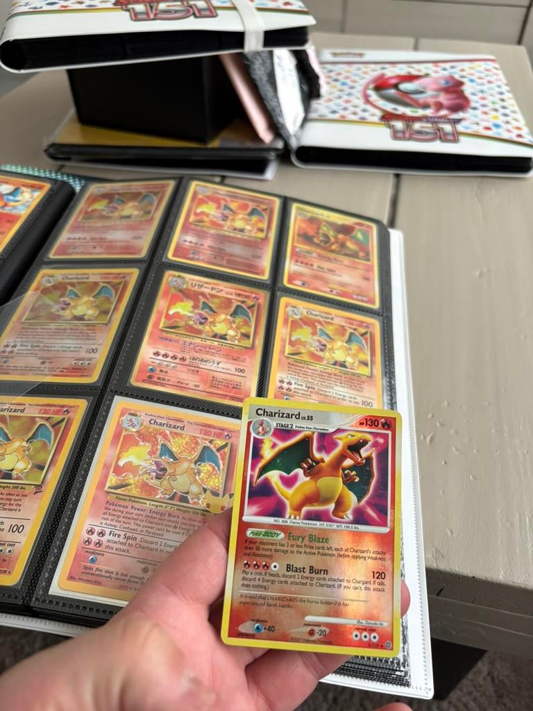 Charizard secret wonders, Ophalen of Verzenden, Zo goed als nieuw, Meerdere kaarten, Foil