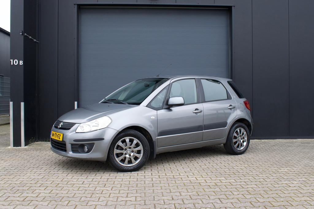 Suzuki SX4 1.6 Exclusive automaat, Auto's, Suzuki, Stof, Gebruikt, Zwart, 49 €/maand
