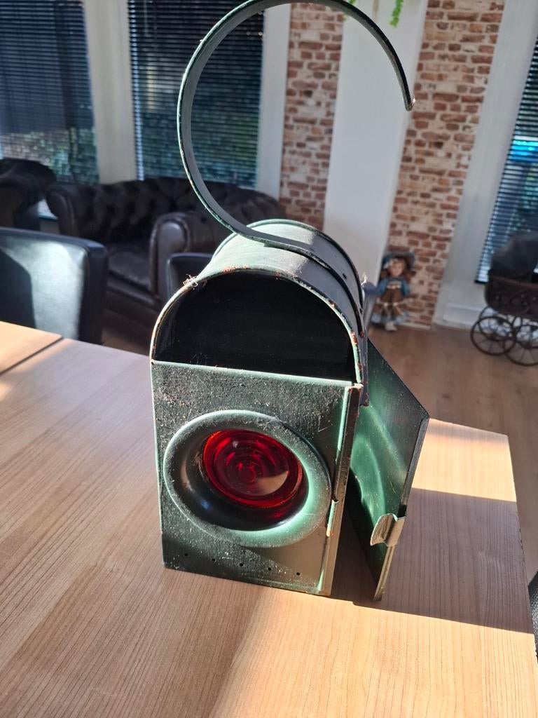 Antieke olielamp, Ophalen