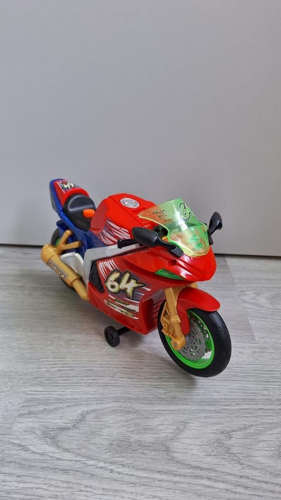 Speelgoedmotor racefiets rood met nummer 64, Ophalen, Gebruikt