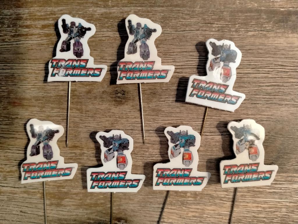 Transformers vintage speelgoed logo speldjes plastic rare, Ophalen of Verzenden, Gebruikt, Overige onderwerpen