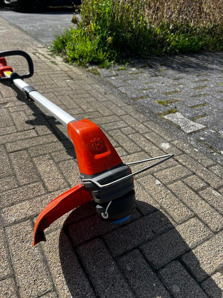 Husqvarna accu trimmer 115iL, Tuin en Terras, Grastrimmers, Ophalen, Gebruikt, Accu