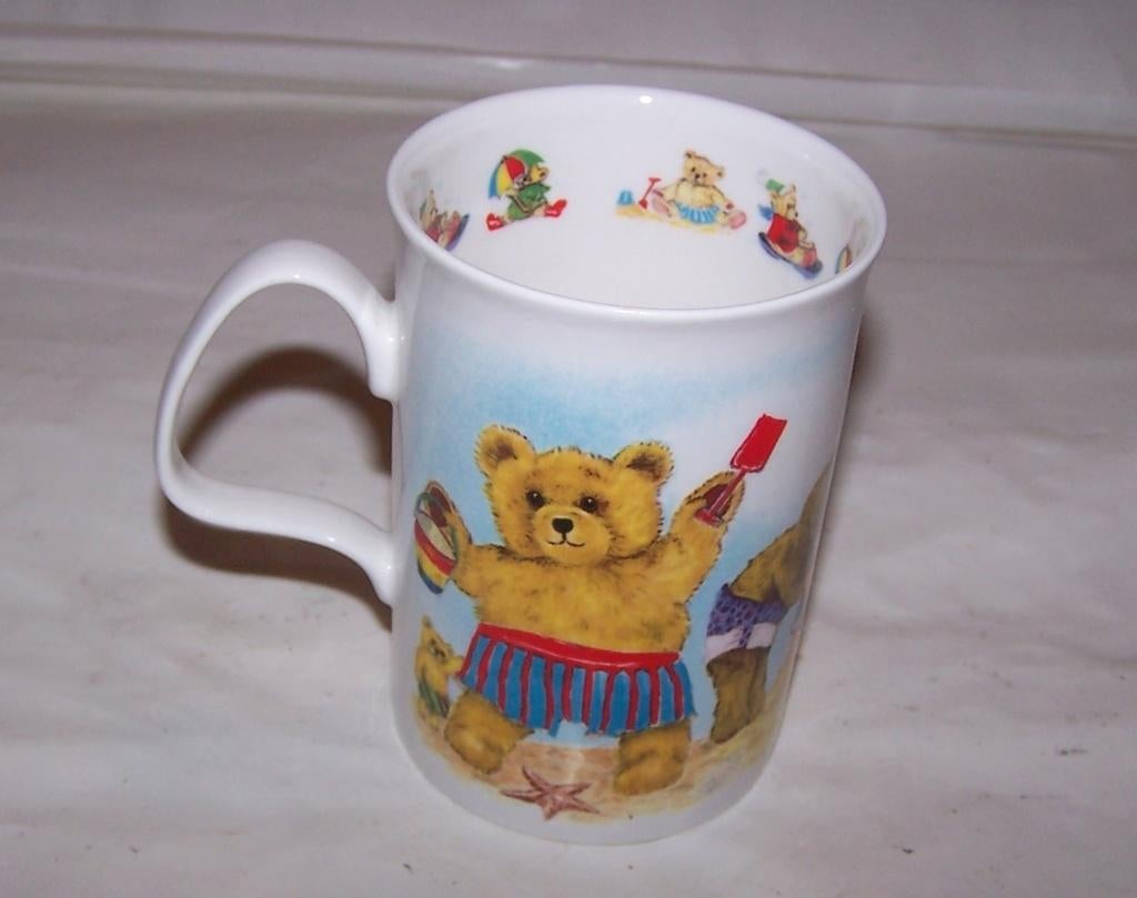 Prachtige porseleinen mok Playtime Teddy by Roy Kirkham.Nwst, Huis en Inrichting, Keuken | Servies, Ophalen of Verzenden, Zo goed als nieuw