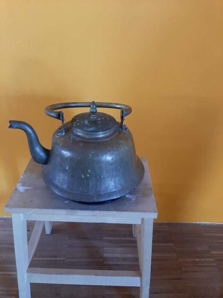 Antieke messing waterketel, Ophalen