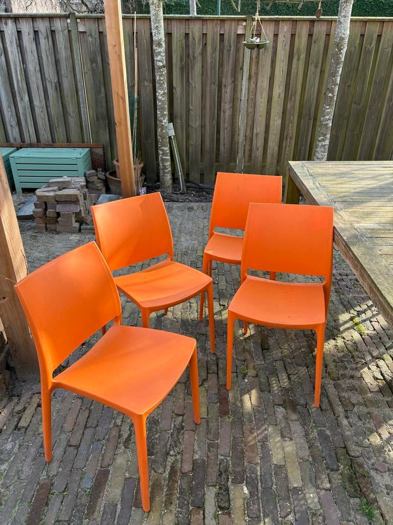 4 oranje tuinstoelen, Ophalen of Verzenden, Gebruikt, Kunststof, Stapelbaar
