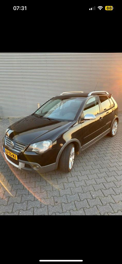 Volkswagen Polo 1.4 16V 59KW Cross 2006 Zwart, Auto's, Volkswagen, Voorwielaandrijving, 15 km/l, 40 €/maand, Zwart