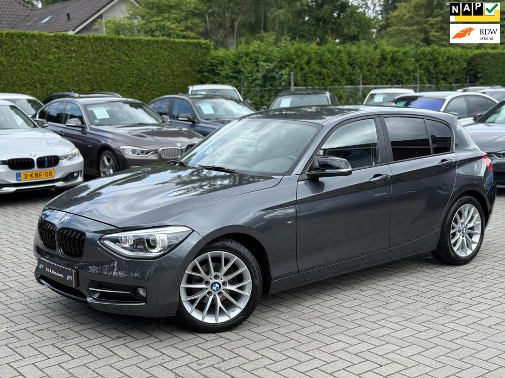 BMW 1-serie 116i Business+ Sport|Nieuwe Ketting + Klepseals|, Euro 5, Gebruikt, Zwart, 4 cilinders