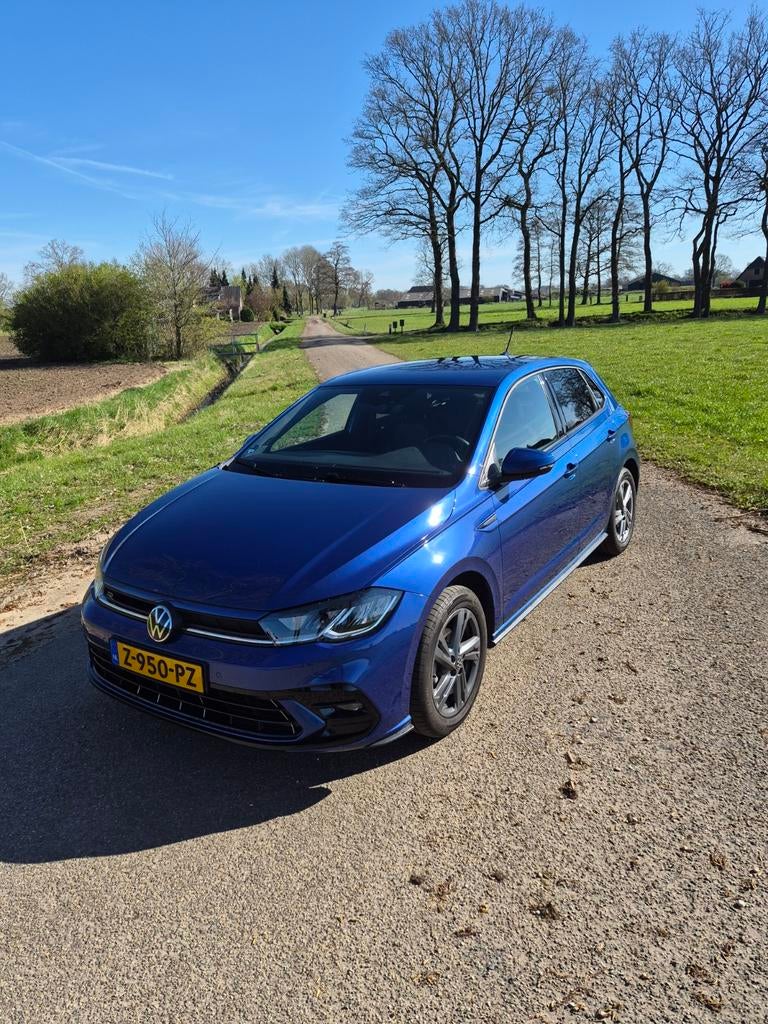 Polo R line full options bj 2024, Voorwielaandrijving, Stof, 95 pk, Blauw