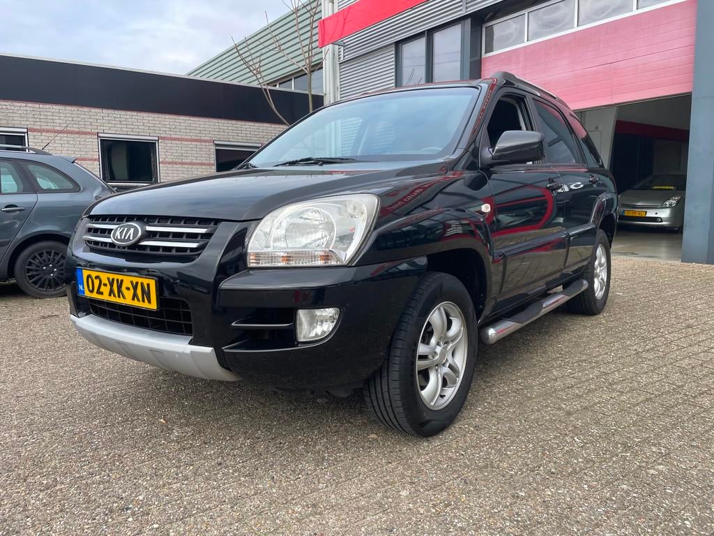 Kia Sportage 2.0 CVVT Comfort clima leer, 1442 kg, Gebruikt, 4 cilinders, Zwart