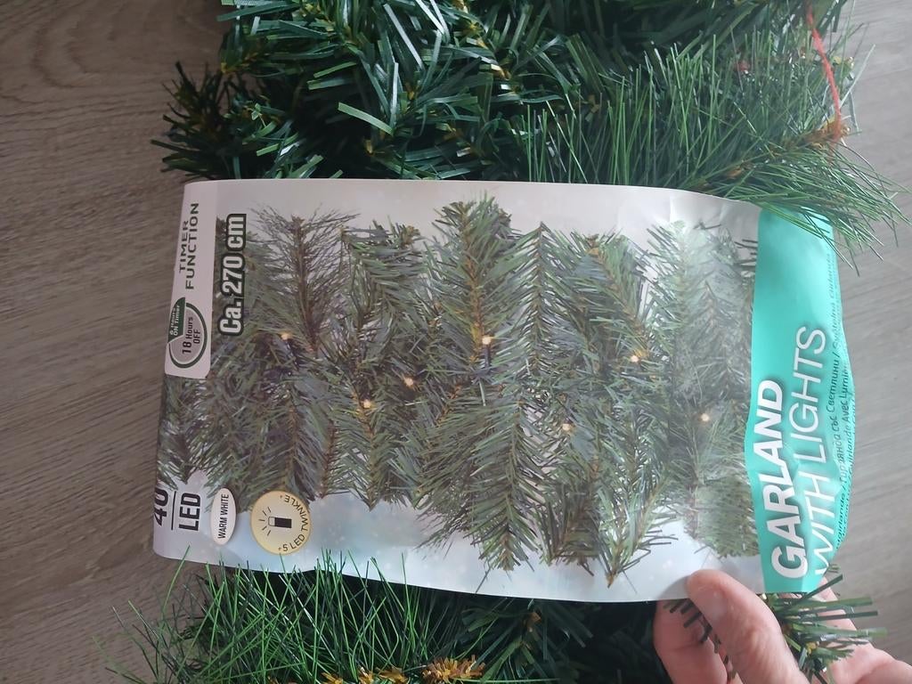 Kerst slinger met licht, Ophalen