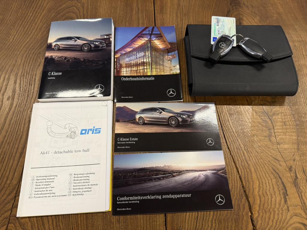 Mercedes-Benz C-Klasse Estate 180 AMG Line | Panoramadak | L, Auto's, Automaat, Achterwielaandrijving, Met garantie (alle), Lichtsensor