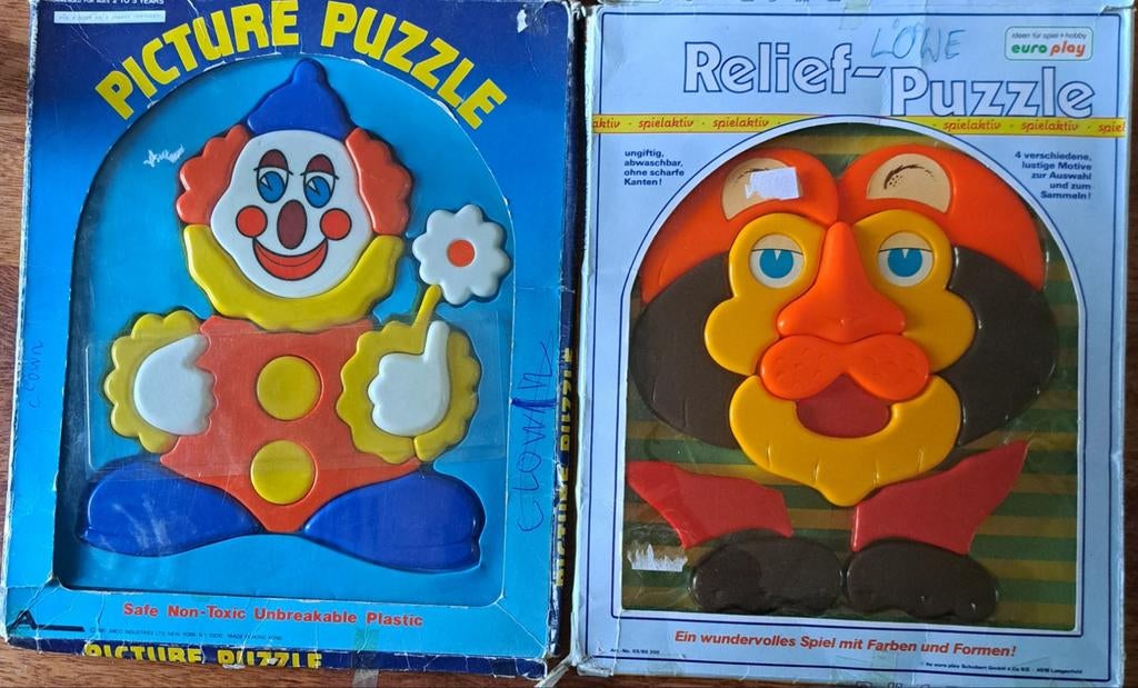 2 vintage plastic puzzels van leeuw en pipo., Ophalen, Overige typen