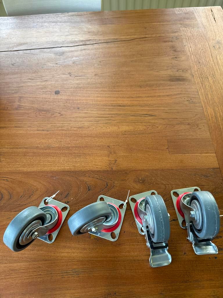 Vier zwenkwielen, waarvan twee met rem, Ophalen of Verzenden, Zo goed als nieuw