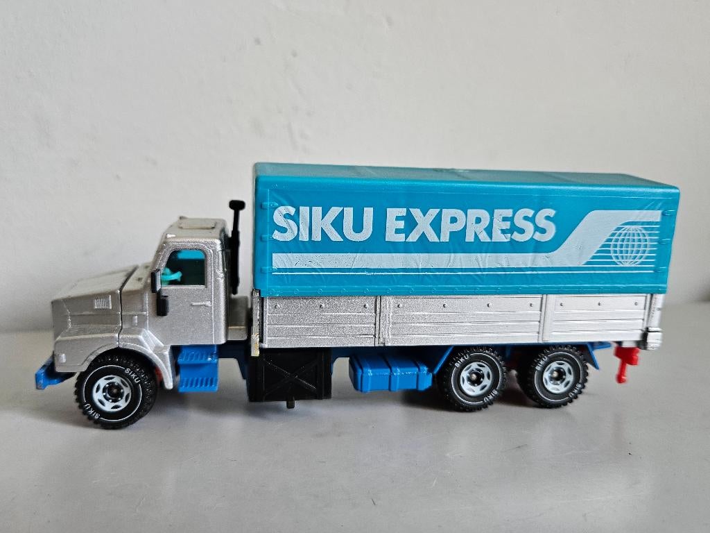 Siku Volvo N10 Siku Expresse grijs met blauwe huif 1:55, Ophalen of Verzenden, Zo goed als nieuw, Bus of Vrachtwagen, SIKU