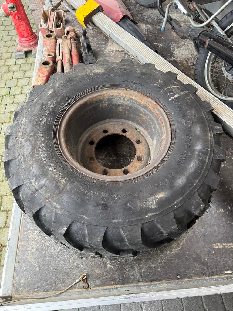 Nwe loader-aanhanger band dunlop, Ophalen