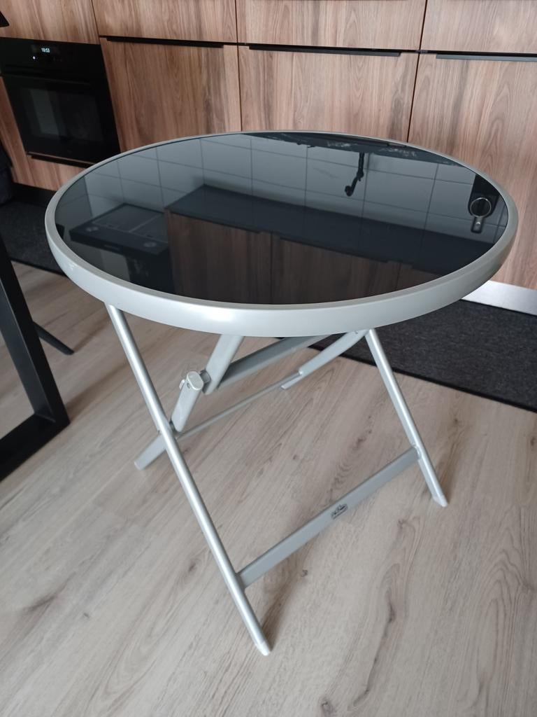 Inklapbare tafel, Ophalen