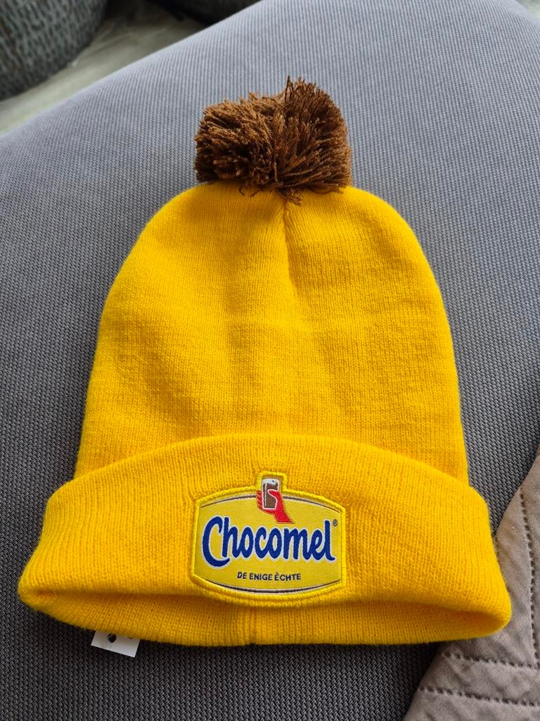 Chocomel Muts met Pompon - Geel, Maat 38/40 (M), Nieuw, Chocomel, Ophalen of Verzenden