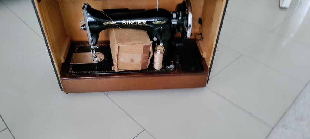 Naaimachine van Singer, Ophalen