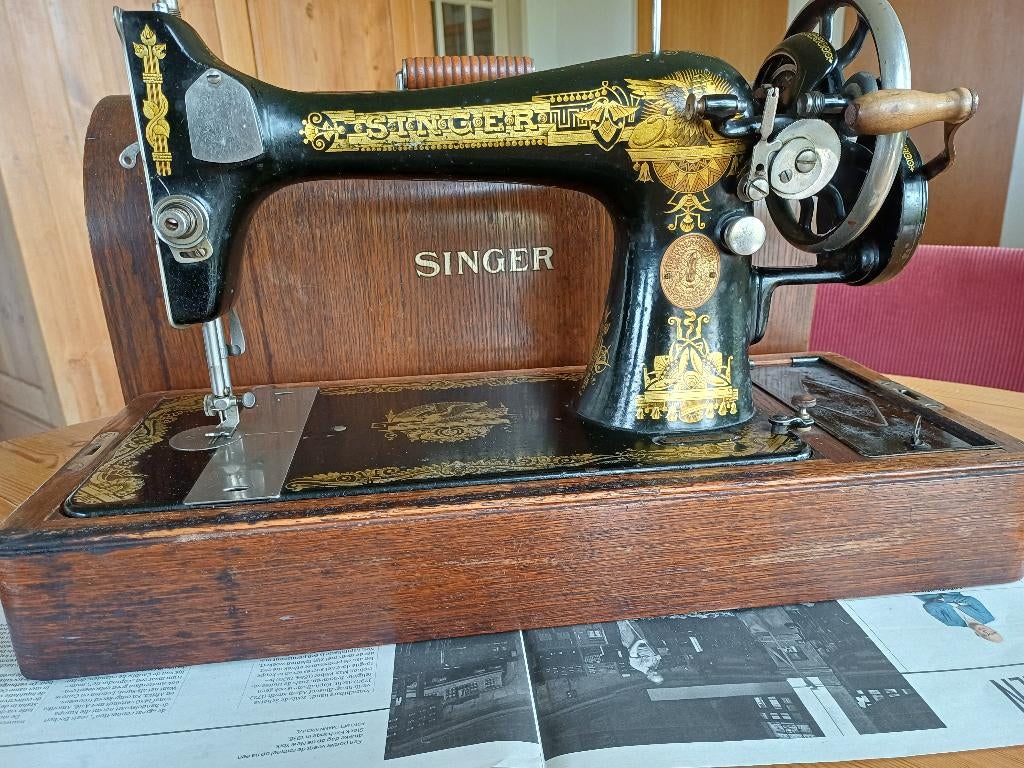 Antieke Singer naaimachine, Ophalen