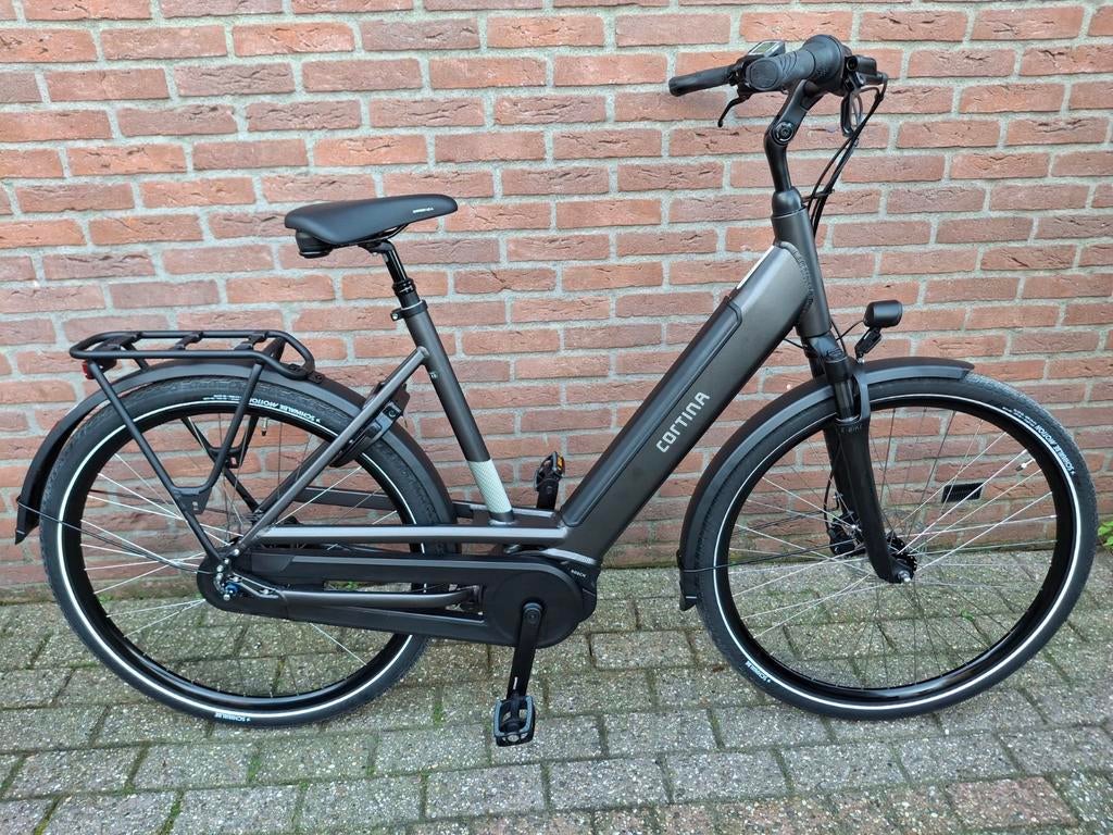 Cortina E-Fello, Fietsen en Brommers, Ophalen, Nieuw, Cortina, 50 km per accu of meer
