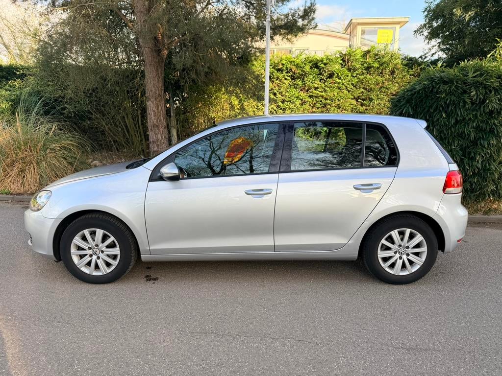 Volkswagen Golf 1.2 TSI 77KW 5D DSG Clima navigatie trekhaak, Stof, Zwart, 4 cilinders, Origineel Nederlands