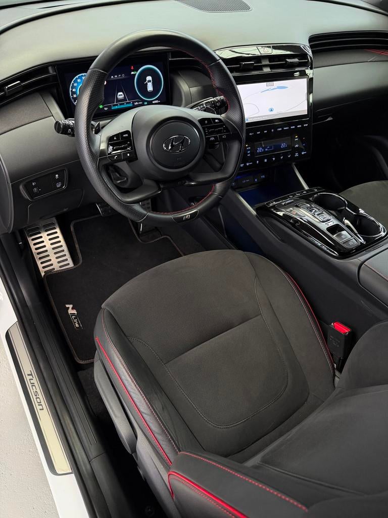 Hyundai Tucson 1.6 T-GDI HEV N Line Camera CarPlay 230pk, Gebruikt, Zwart, 4 cilinders, Met garantie (alle)