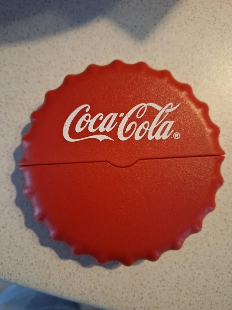 Coca-Cola pizza snijder, Ophalen