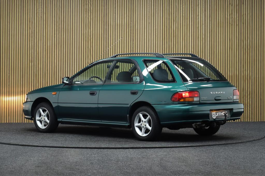 Subaru Impreza Plus 1.6 GL AWD | 1-Ste Eigenaar | Trekhaak |, Auto's, Stof, Gebruikt, 4 cilinders, Origineel Nederlands